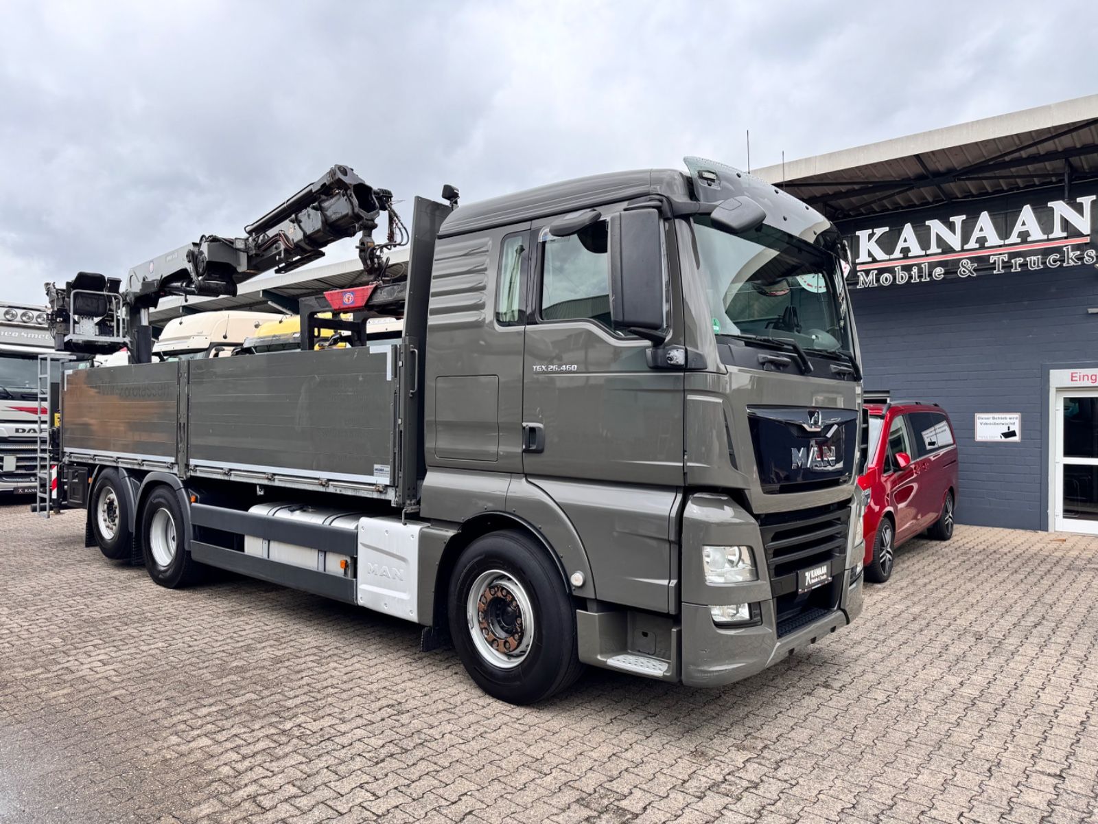 MAN 26.460 TGX Baustoffkran HMF 2110-L3