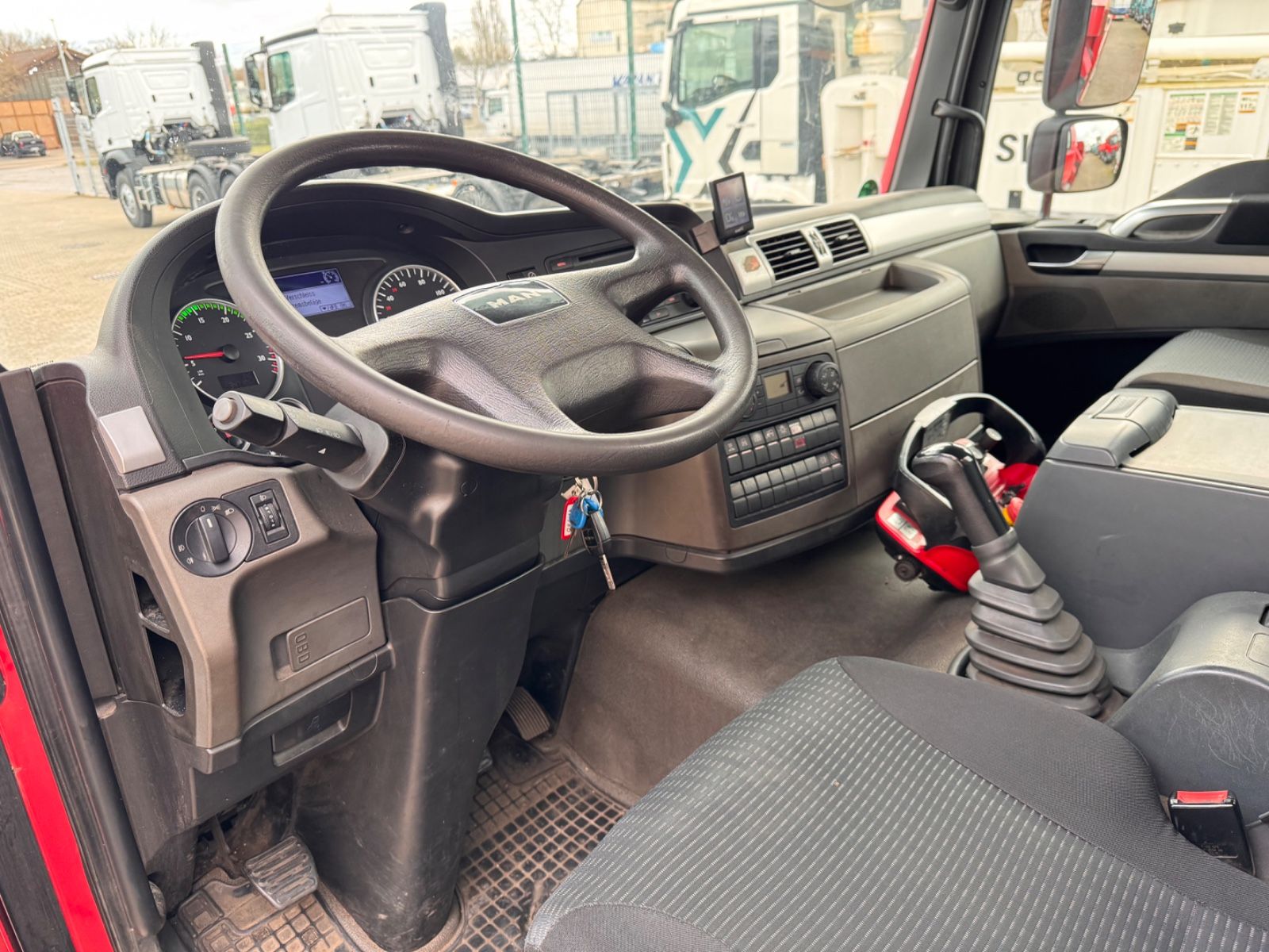 Fahrzeugabbildung MAN TGM 18.340 Langmaterial Palfinger PK13001K Funk