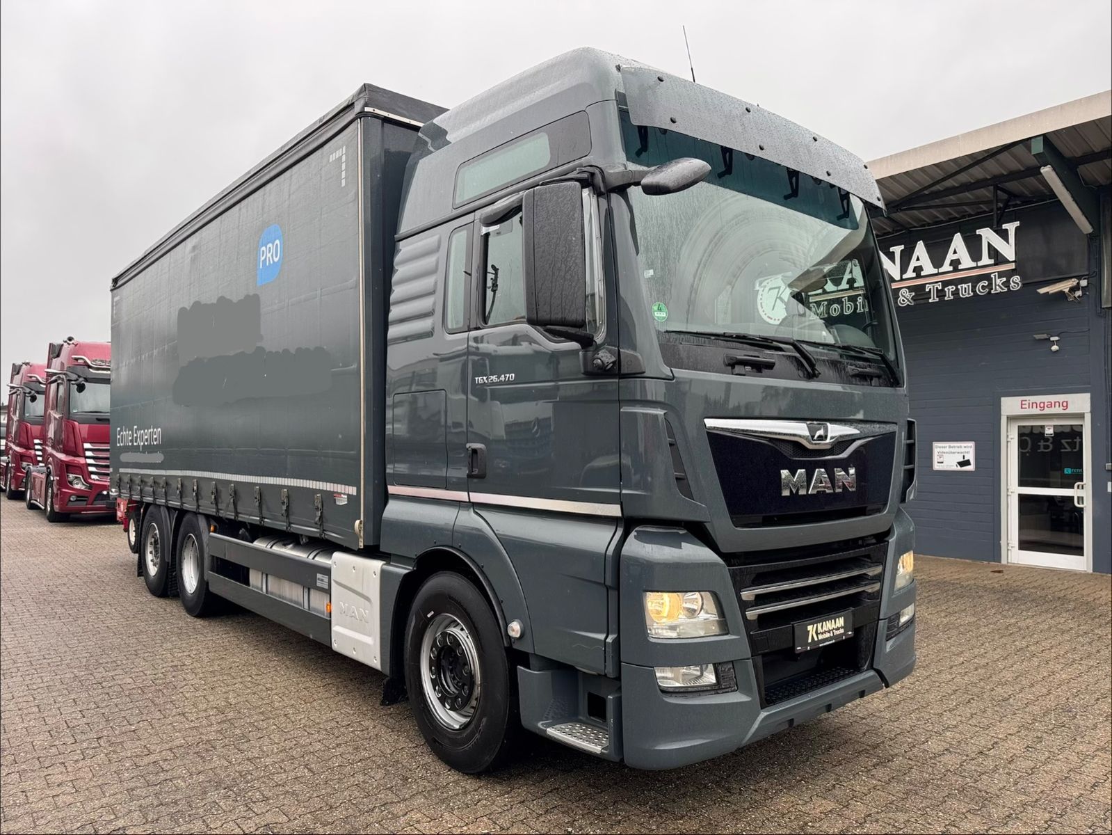 Fahrzeugabbildung MAN 26.470 XXL TGX  Mitnahmestapler Moffett M4 NX