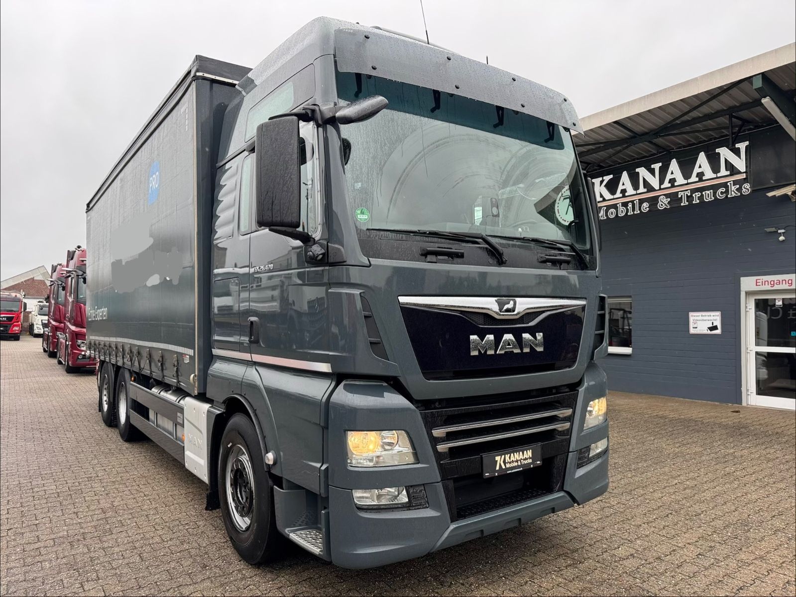 Fahrzeugabbildung MAN 26.470 XXL TGX  Mitnahmestapler Moffett M4 NX
